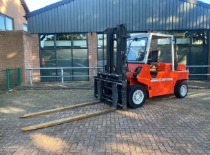 1991 O & K V60 - Forkpositioner + Sideshift