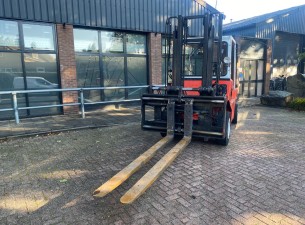 1991 O & K V60 - Forkpositioner + Sideshift